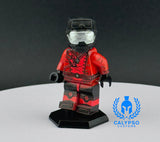 Custom action figure with red and black design on a gray background, featuring the Calypso Customs logo.
