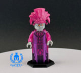 Toy figure with pink headdress and purple outfit on a white surface with dark background