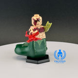 Miniature figure on a stand with a dark gray background and Calypso Customs logo.